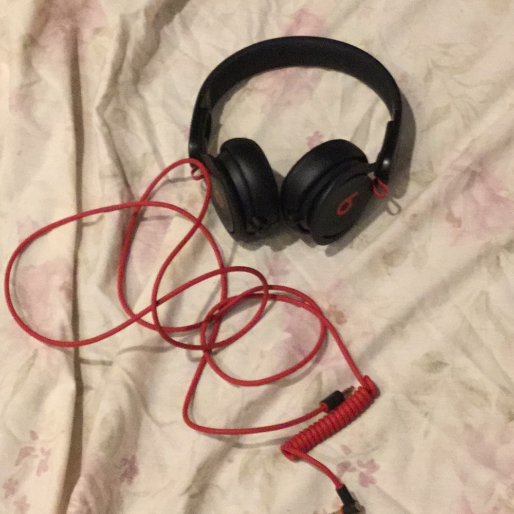 Beats black red earphones